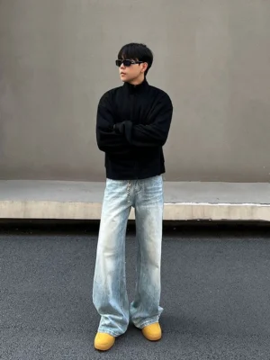 Front view of light blue ice fade straight jeans with button fly, relaxed full-length legs, and modern Seoul streetwear styling
