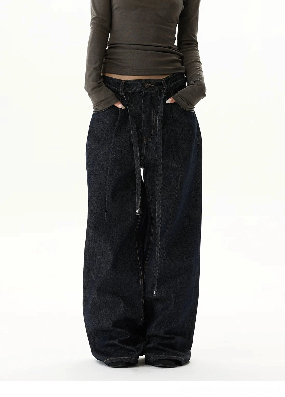 Indigo balloon jeans with ultra-wide puddle legs and adjustable tie waist styled as contemporary Korean streetwear denim