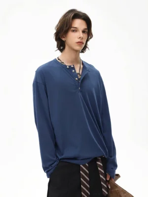 Indigo navy blue oversized Henley long sleeve streetwear tee styled with black trousers and necktie
