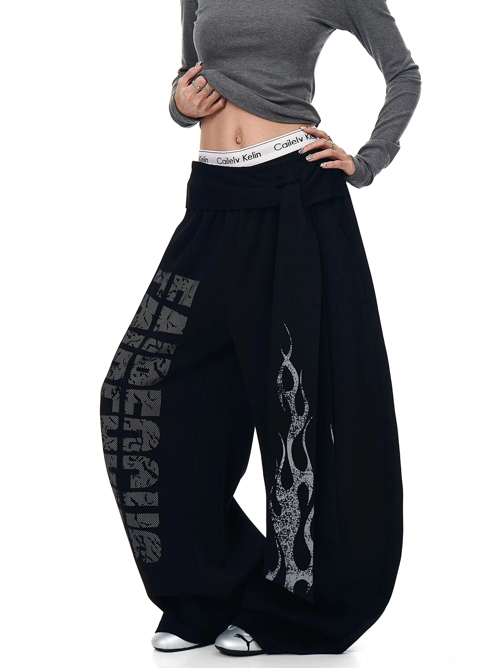 Inferno wrap wide-leg fleece streetwear sweatpants detailed product view with oversized graphic silhouette