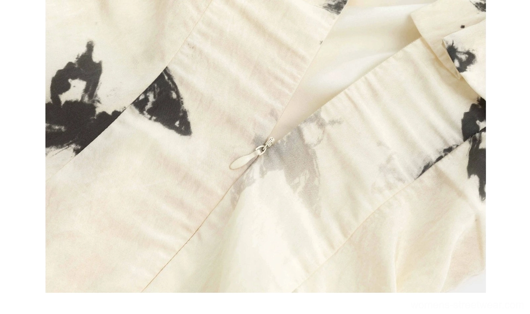 Invisible zipper closure detail on cream and black ink butterfly print off-shoulder dress