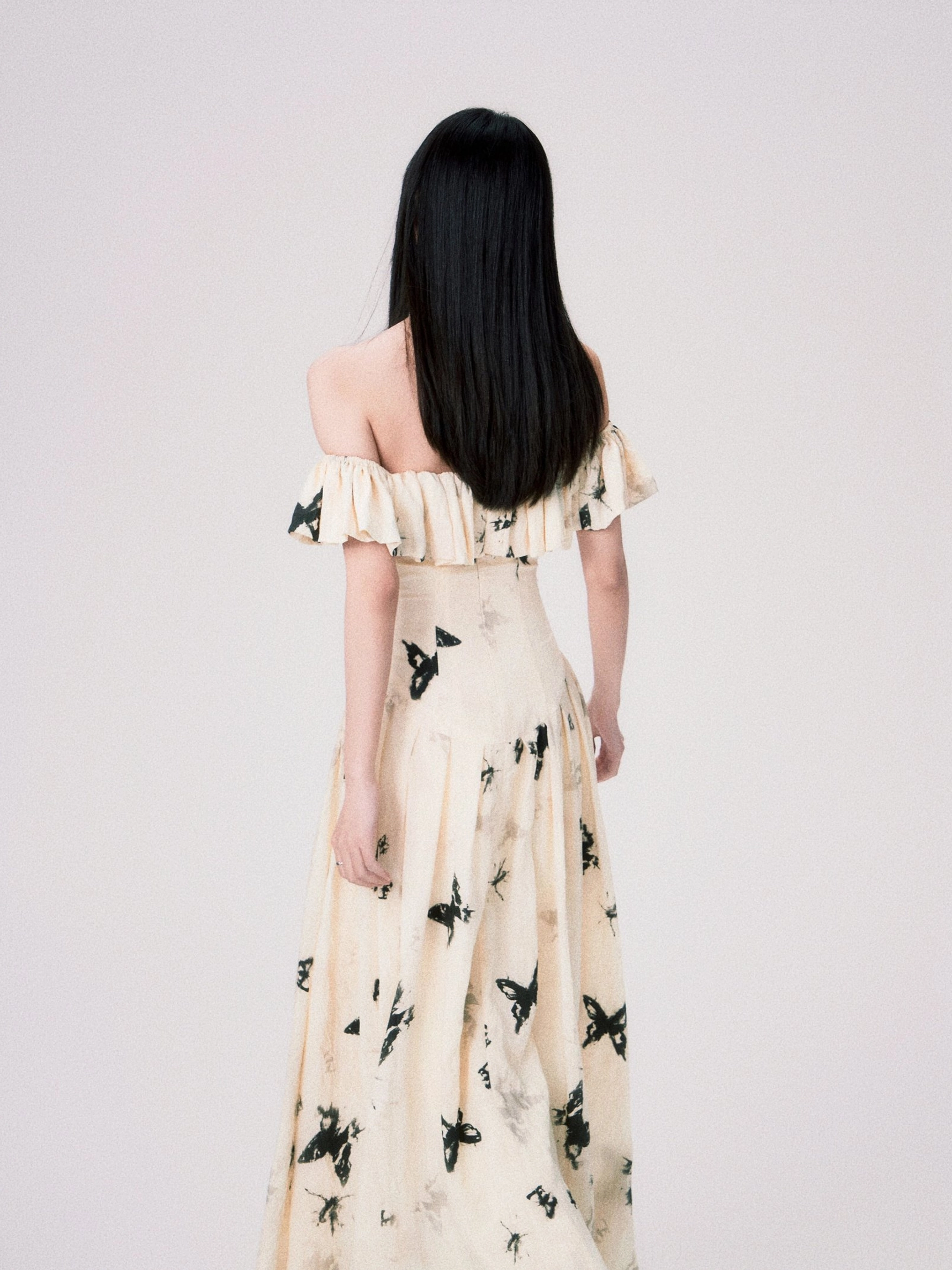 Ink butterfly off-shoulder ruffle dress fitted bodice and flared skirt detail
