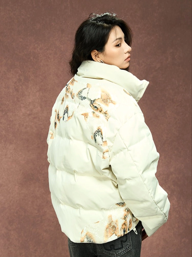 Female side back view of ivory flame lace cropped puffer jacket with relaxed short streetwear fit