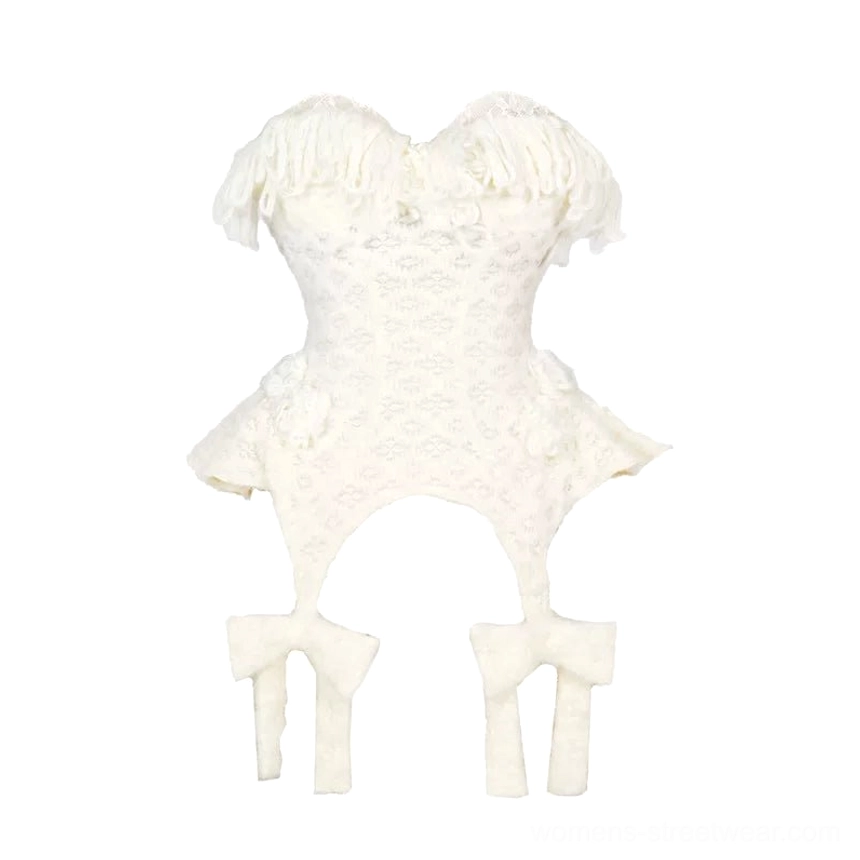 Ivory fringe knit corset top styled as a knitted bra option with sculpted bust shape, fringe texture, and romantic streetwear appeal