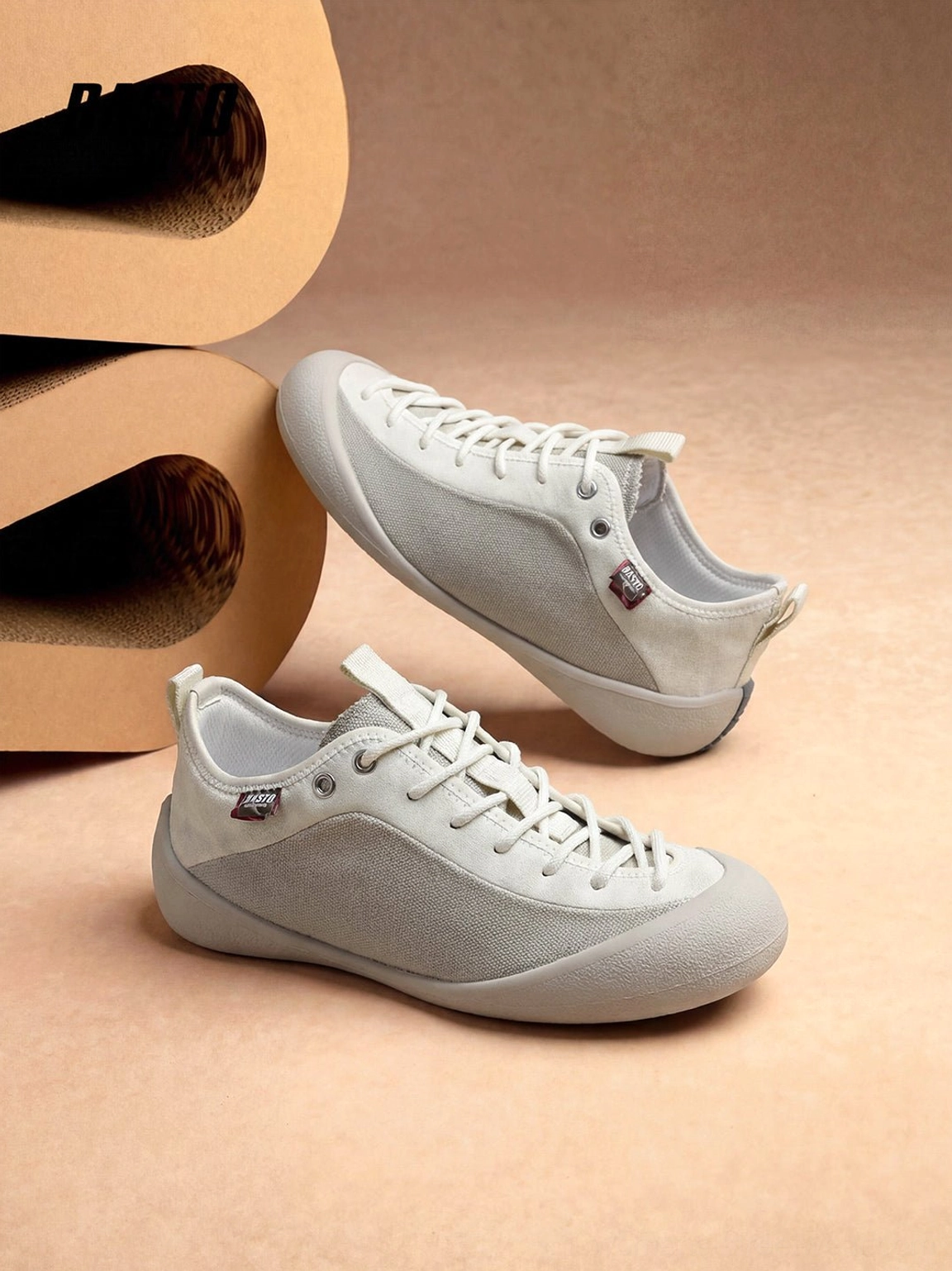 Top angled view of ivory white gray mesh-panel canvas low-top sneakers with classic lace-up design