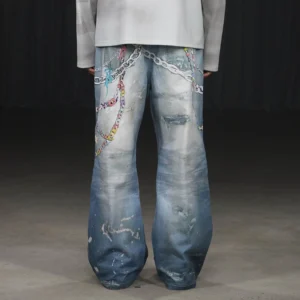 Rear view of faded blue Kawaii wide-leg jeans with chain decorations distressed denim finish and relaxed streetwear silhouette