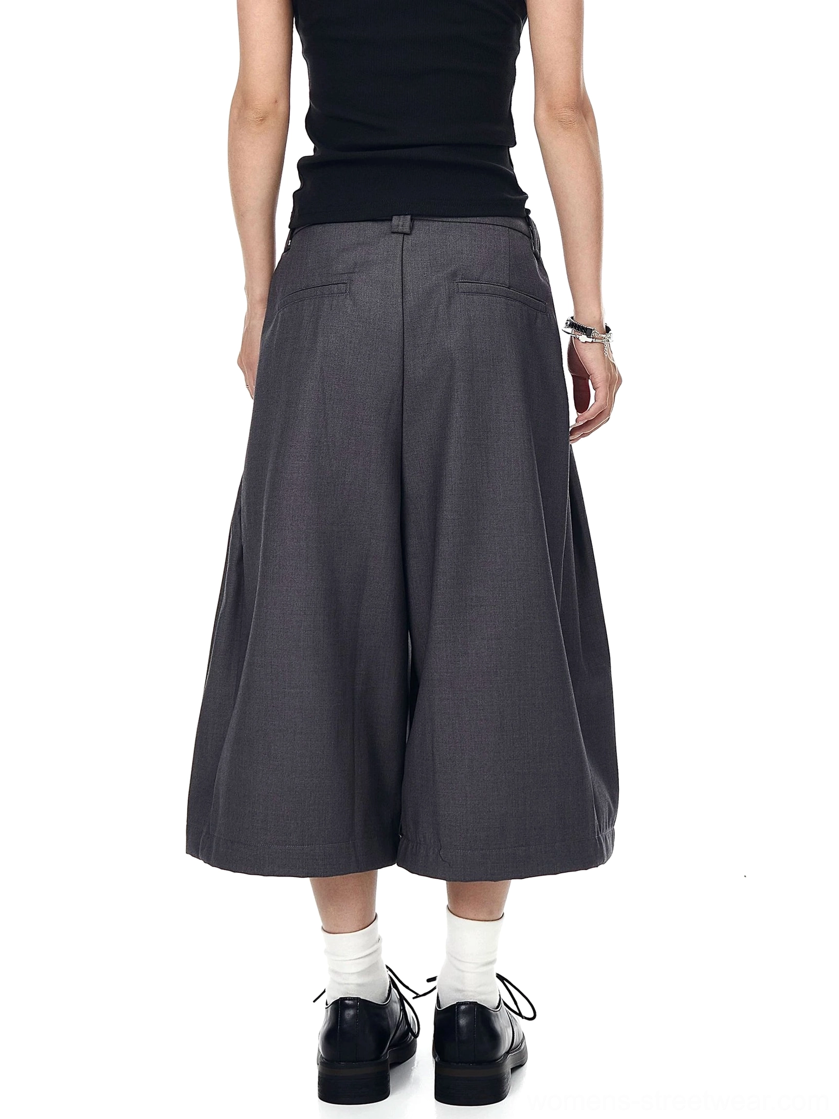 Keyring pleated wide-leg culotte trousers in contemporary Korean streetwear style with cropped tailoring and utility-inspired details