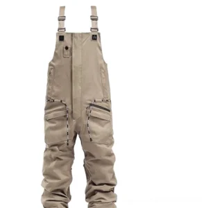 Khaki 15k waterproof utility bib snow pants hanging on a white background, showing adjustable buckle suspenders and zippered cargo pockets