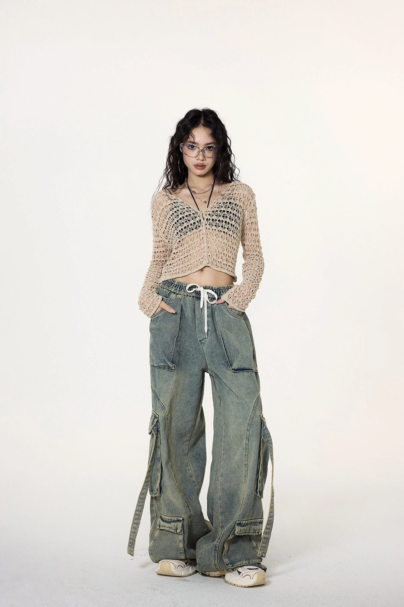 Khaki button-front crochet cardigan product image showing the delicate hollow-out knit texture and cropped fit