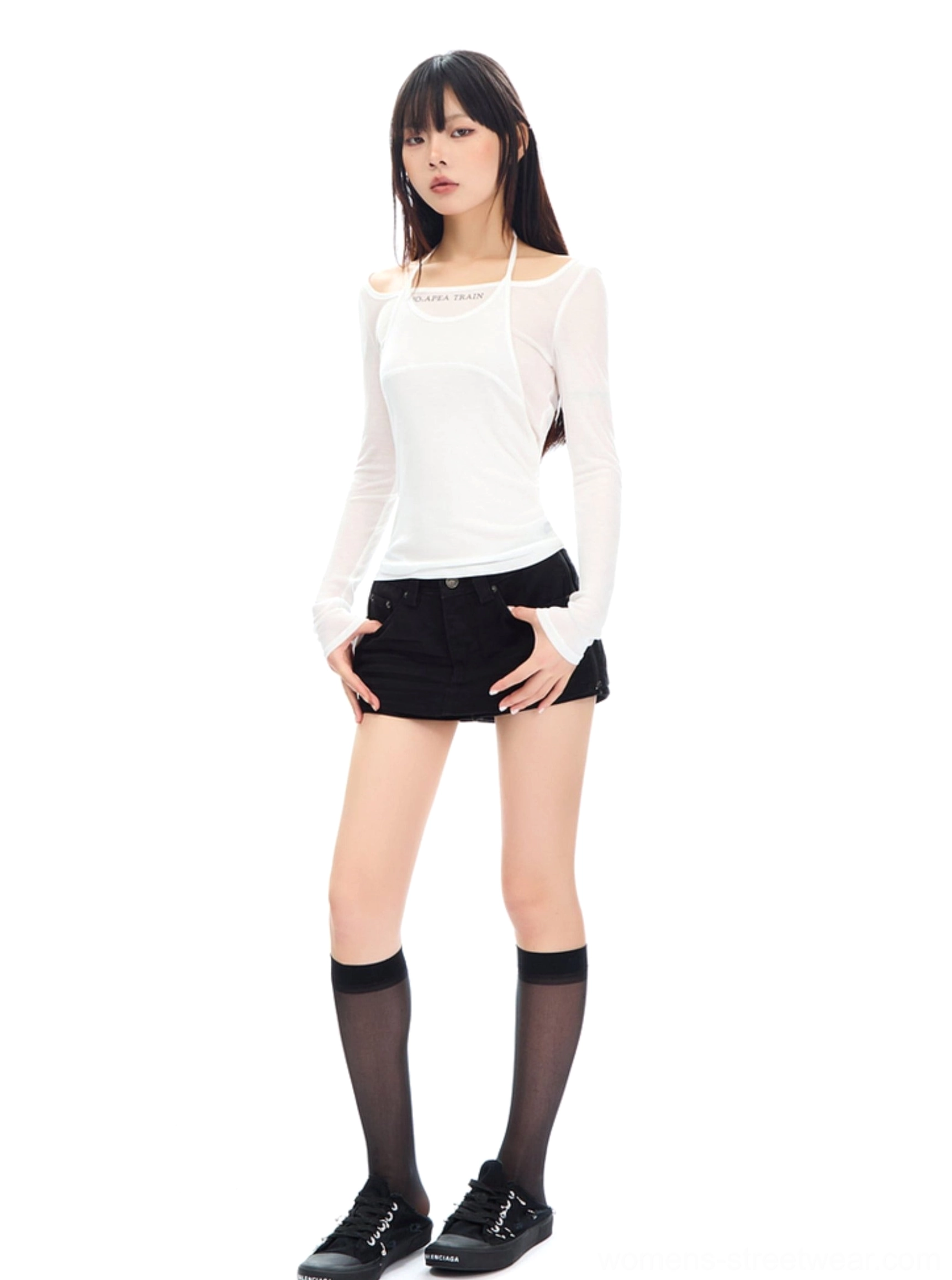 Khaki denim mini skirt product detail showing the faded finish, compact mini length and contemporary low-rise silhouette