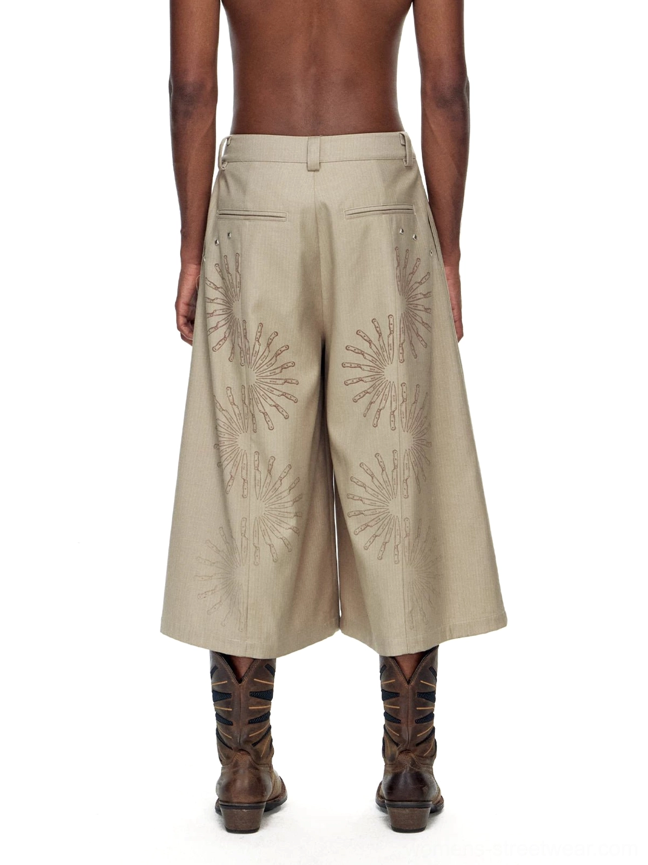Back view of khaki embroidered cropped wide-leg streetwear trousers with sunburst detail on pant legs