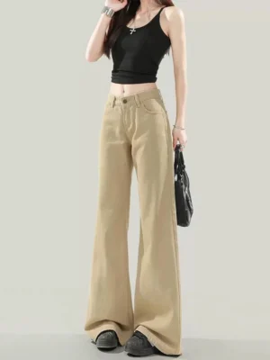 Khaki low-rise flared jeans for women with stretch denim, classic pockets, long wide bell-bottom leg, and neutral streetwear styling