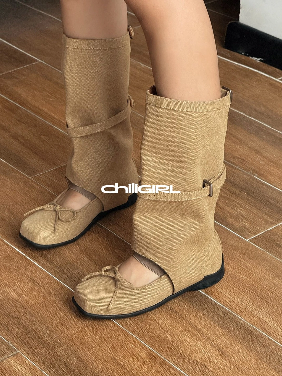 Three-quarter side view of khaki denim Mary Jane mid-calf boots with layered buckle straps