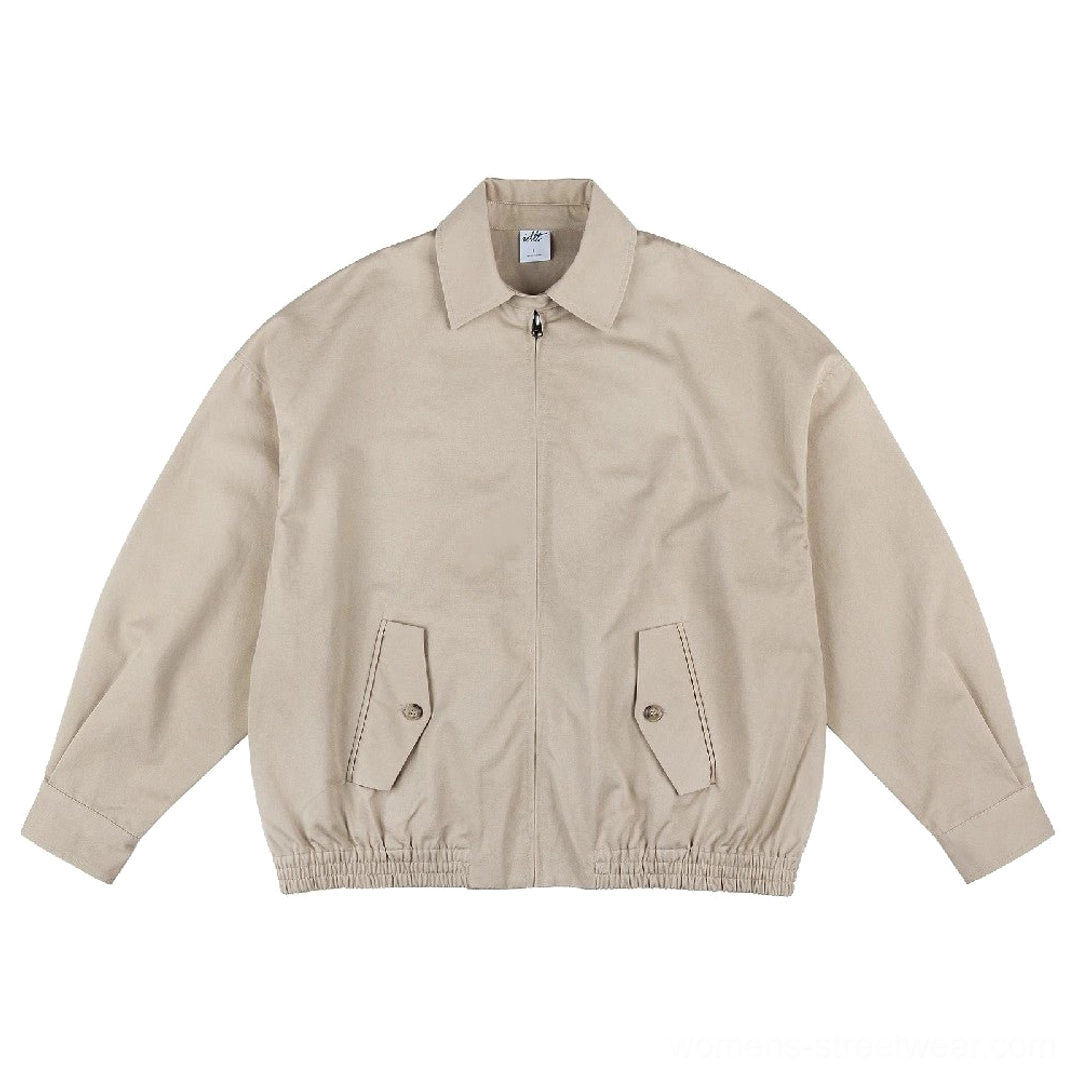 Khaki oversized cotton work jacket with front zipper pointed collar flap pockets and relaxed streetwear silhouette
