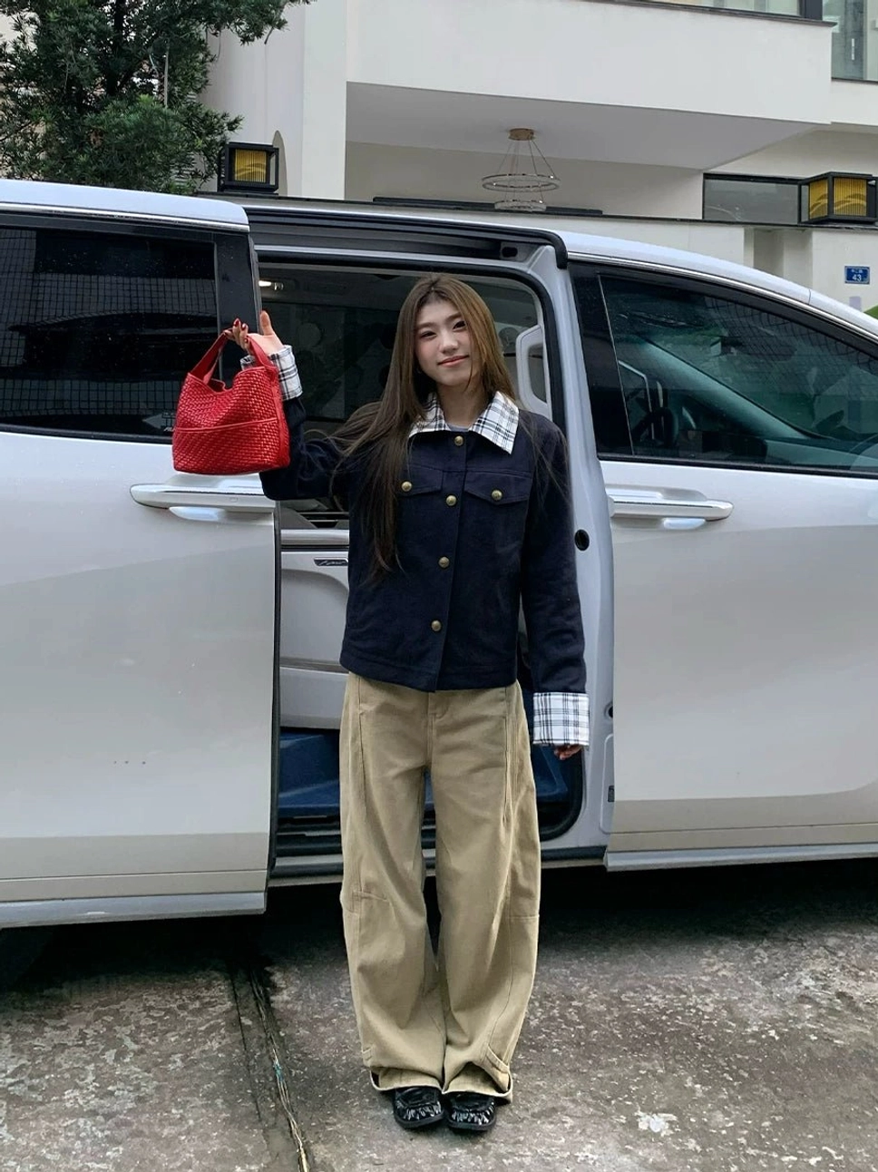 Khaki panel-seam wide-leg jeans styled in a modern Korean streetwear outfit with a relaxed oversized fit