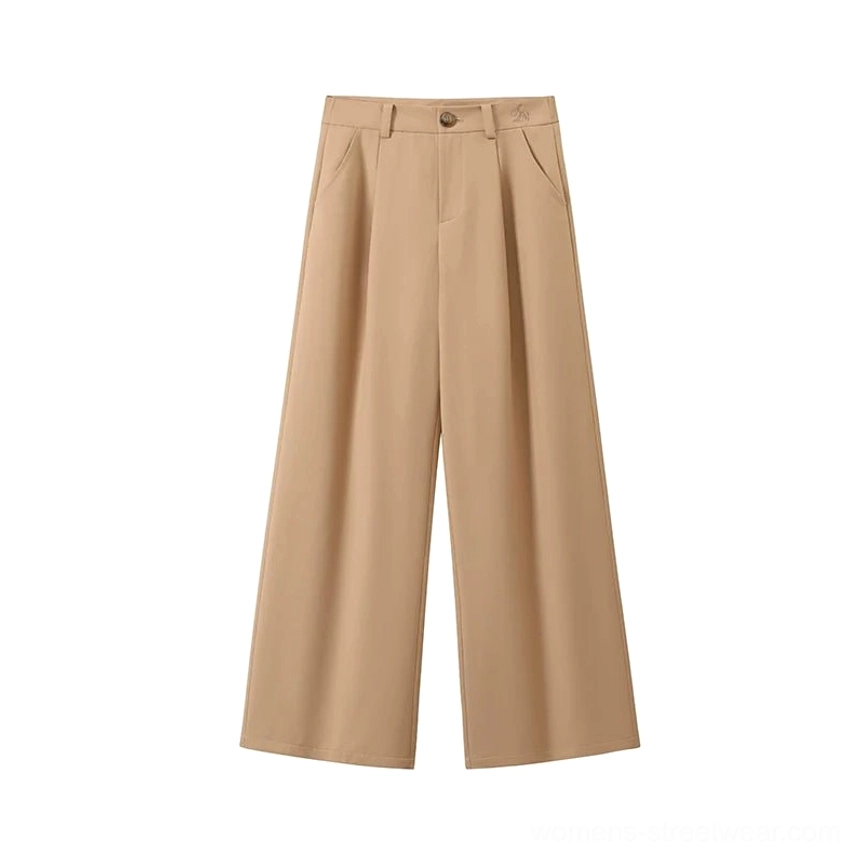 Khaki pleated wide-leg trousers shown in a flat lay with front waistband button, zipper, and tailored pleat details