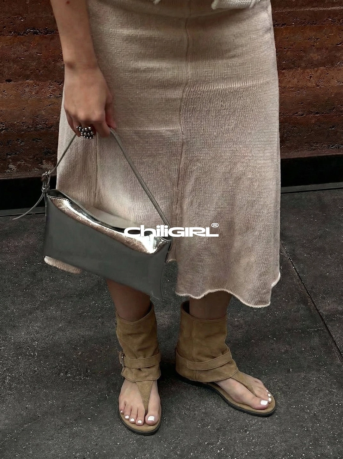 Khaki slouchy suede thong toe sandal ankle boots with beige knit midi skirt and silver shoulder bag