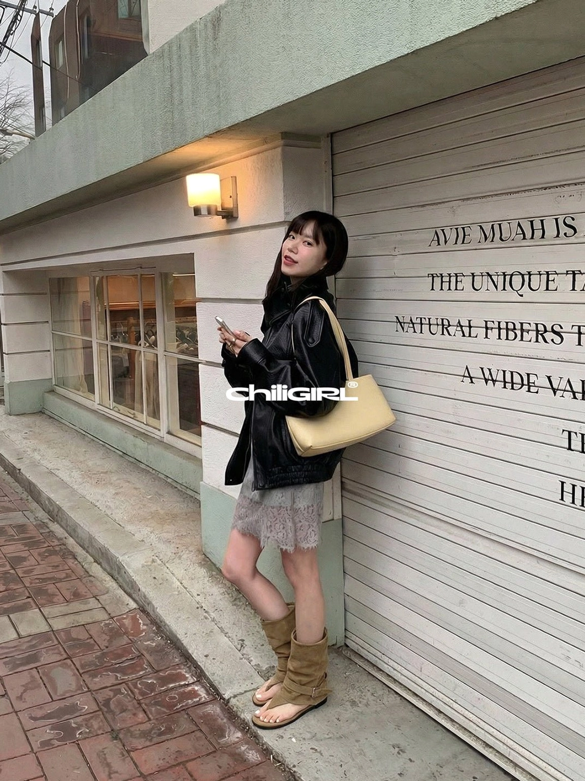 Khaki suede slouchy open toe ankle boots styled with black leather jacket and grey mini skirt