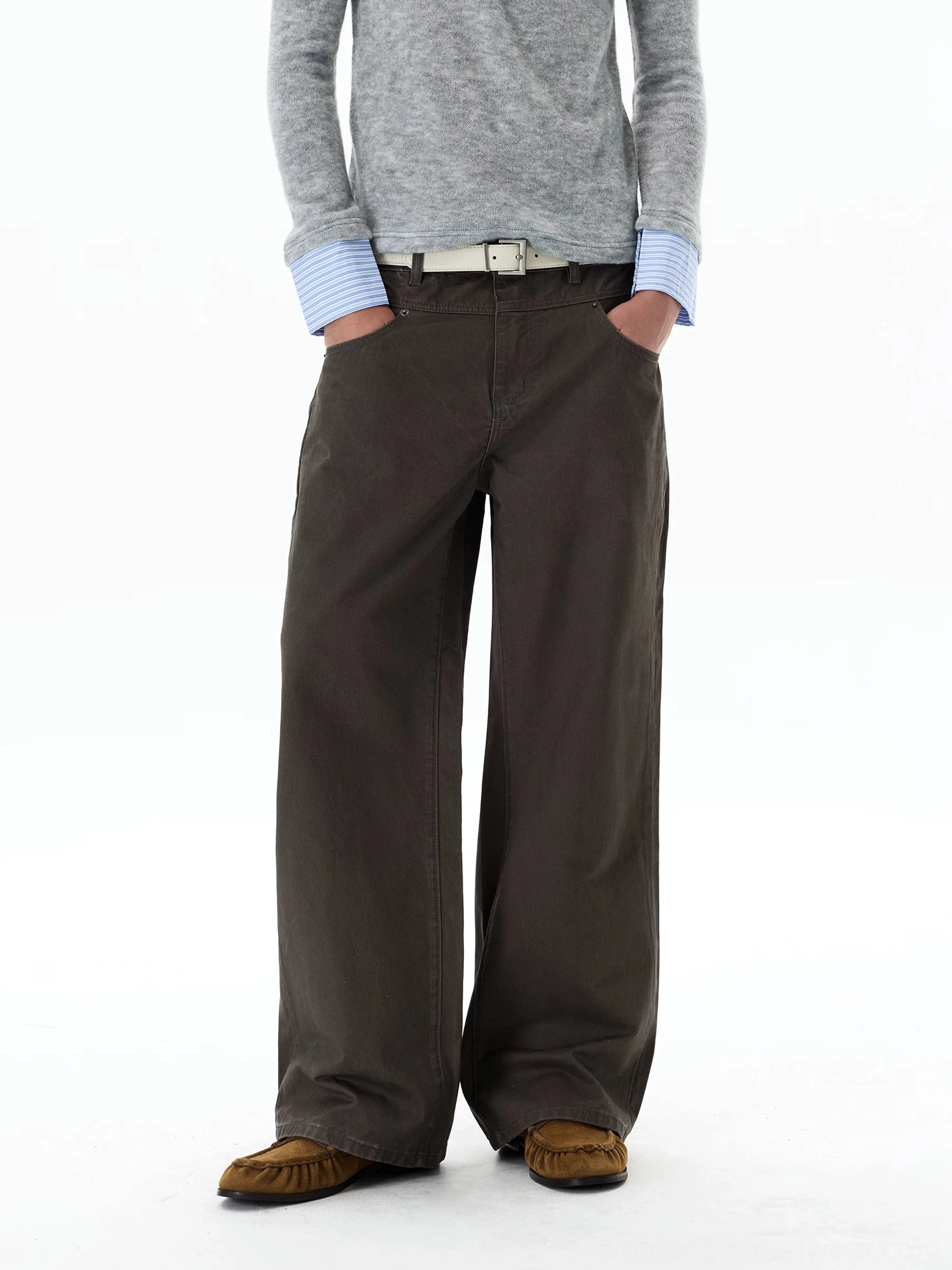 Front flat lay of khaki wide-leg chino pants with five-pocket workwear construction and full-length loose legs