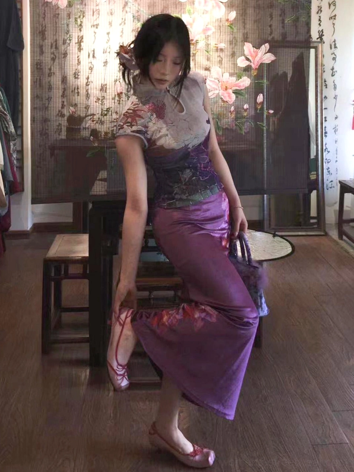 Dusty pink-inspired ballet flat styling with a low kitten heel shown with a traditional East Asian fashion outfit