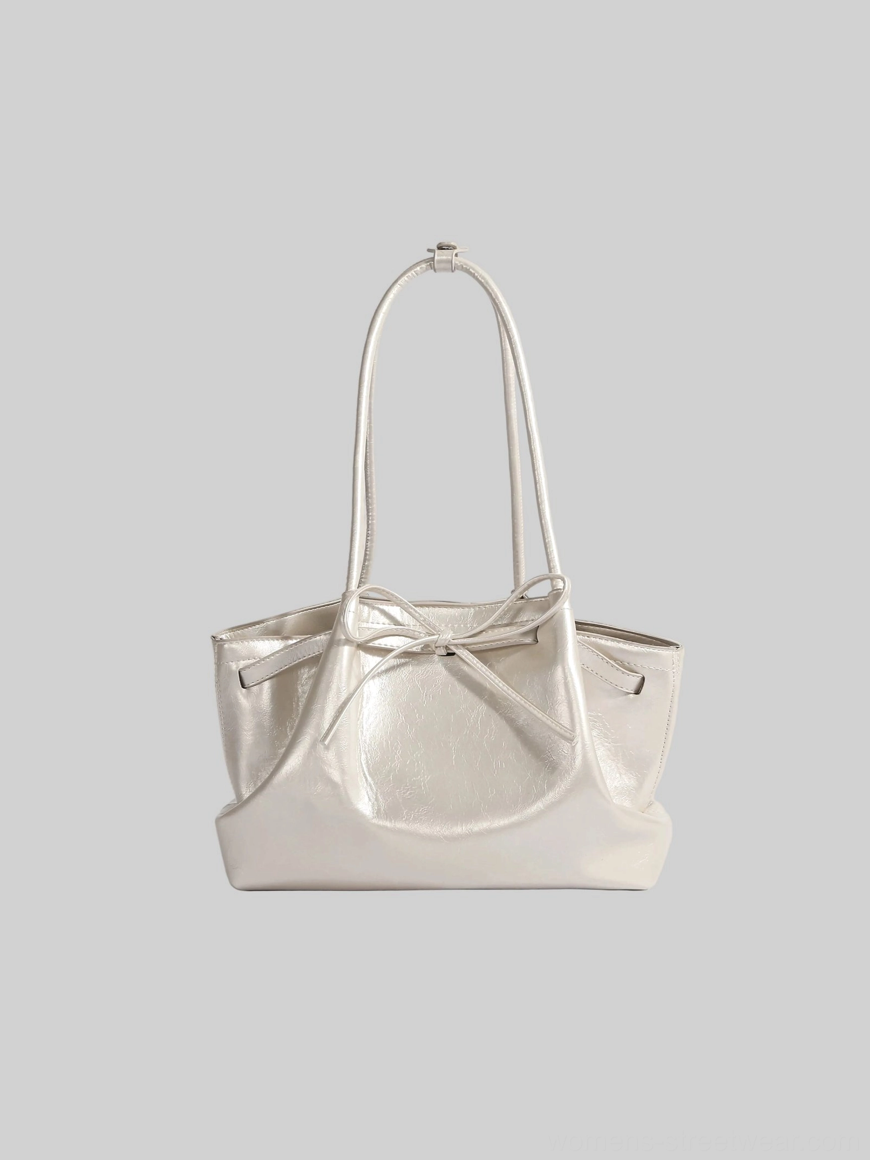 Champagne gold Korean bow cinch shoulder tote bag with glossy finish and bow-tied front strap