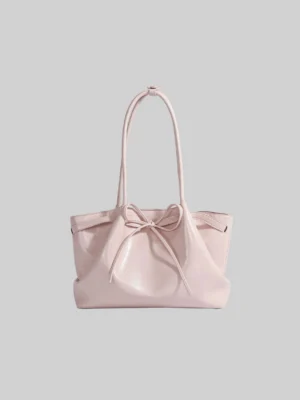 Pastel pink Korean bow cinch shoulder tote bag with gathered body and front bow detail