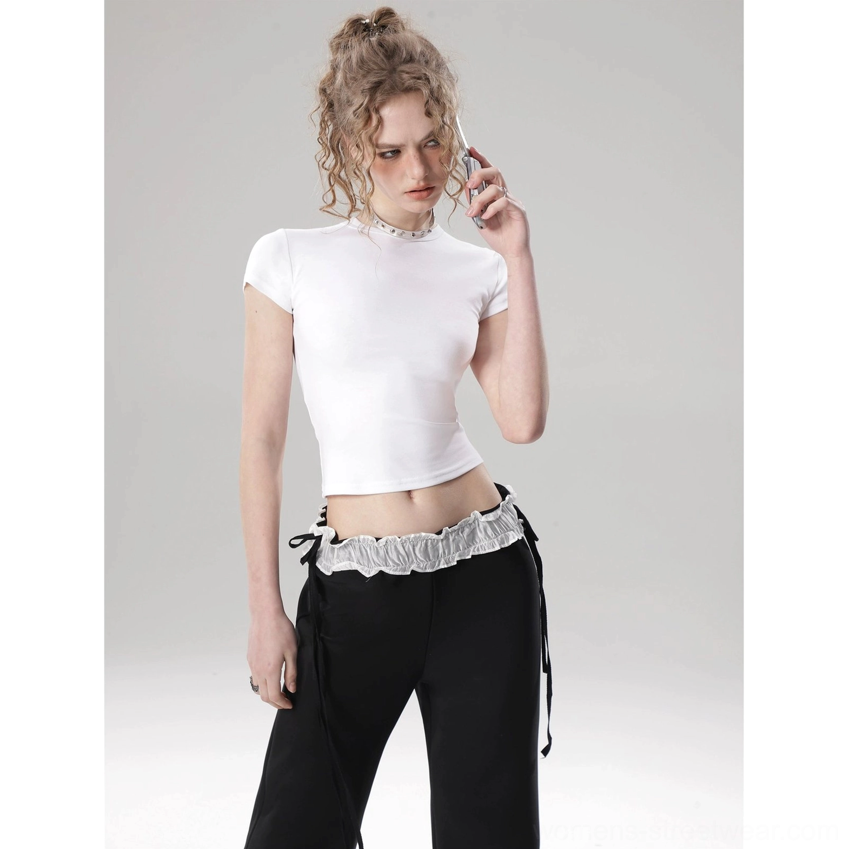 Korean fashion inspired solid color crop top with soft flutter sleeves and contemporary fitted cut