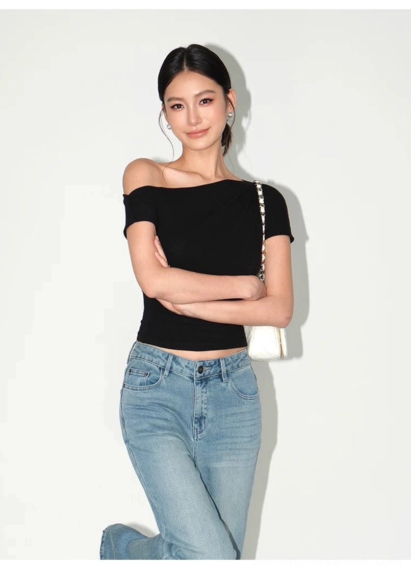 Korean-inspired asymmetric one-shoulder knit T-shirt with a body-hugging silhouette and soft stretch finish