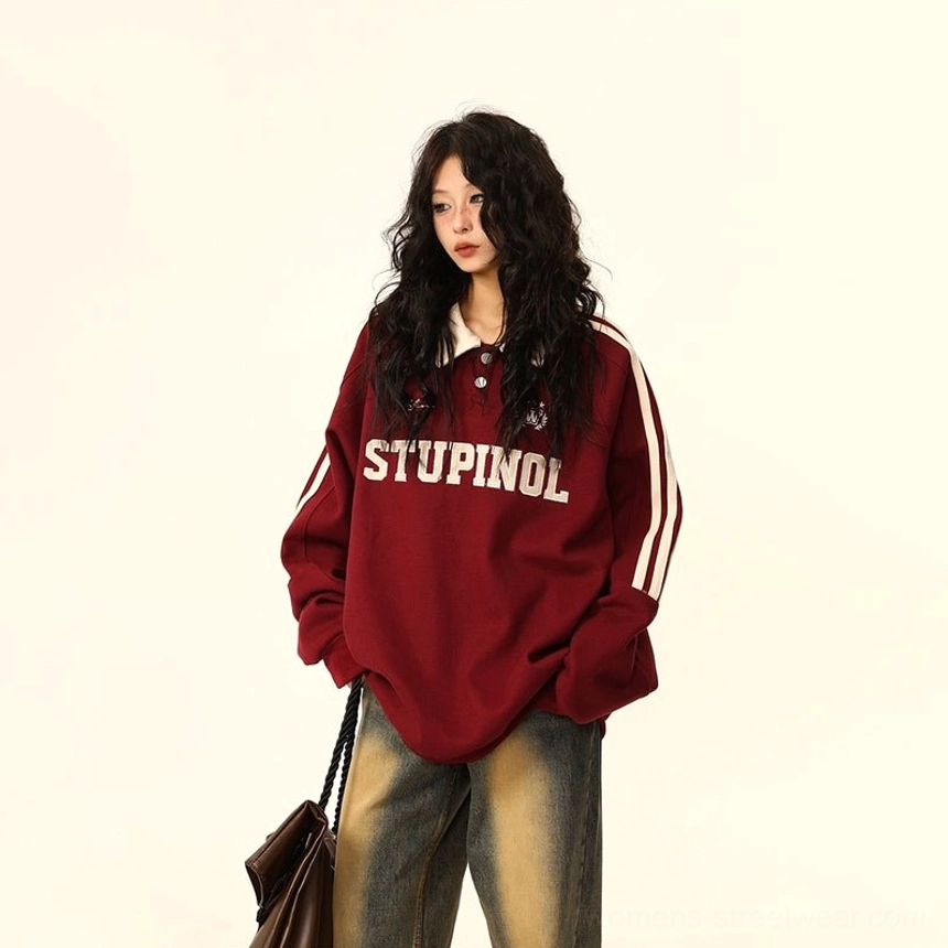 Korean-inspired oversized polo sweatshirt with varsity styling, textured fabric, and casual layered outfit appeal