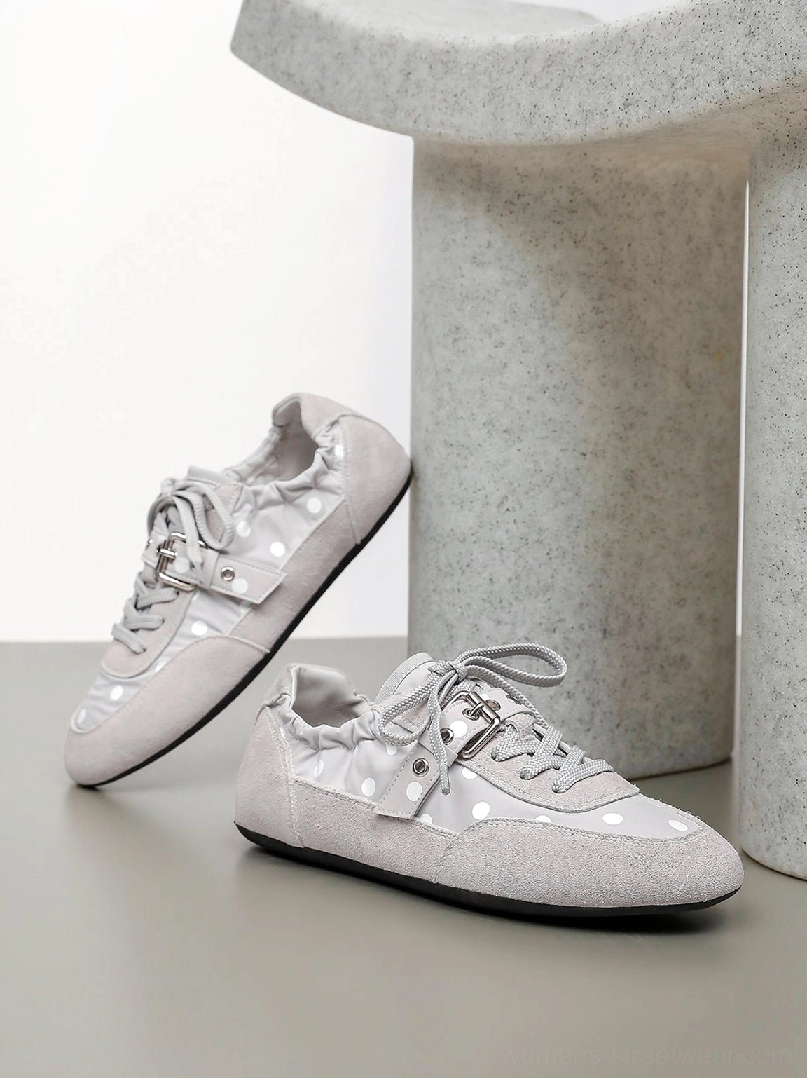 Korean streetwear style polka dot ballet sneakers designed with a slim profile and playful graphic upper