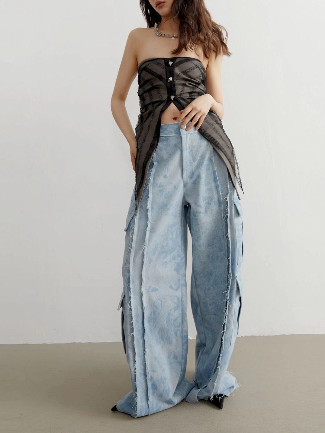 Korean streetwear inspired sheer asymmetric tube top with a slim corset-style fit and metallic accents
