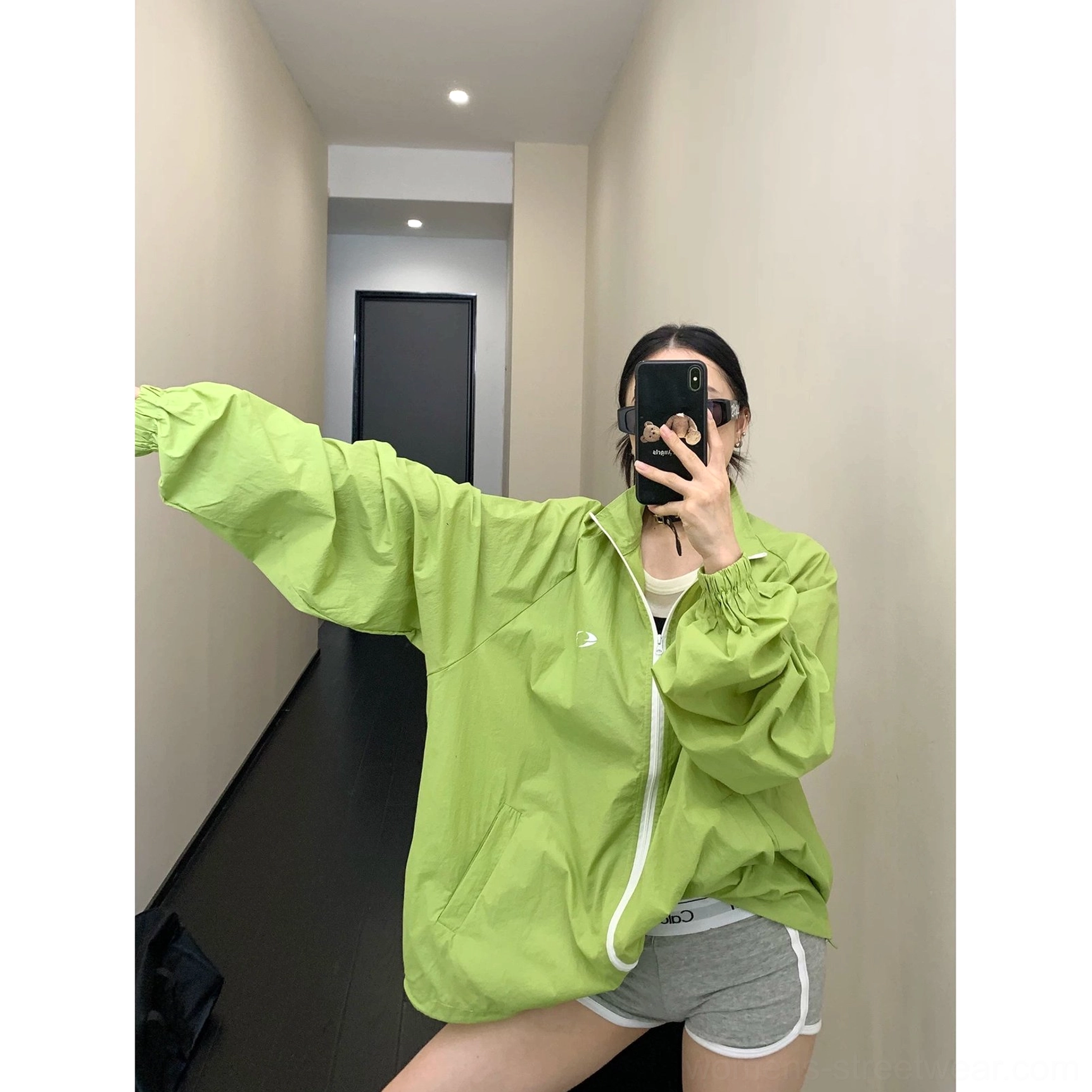 Korean streetwear windbreaker jacket product image with oversized silhouette, high collar, full front zipper, slanted side pockets, and casual layering design