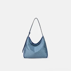 Dusty blue large geometric monogram hobo shoulder bag with matching blue strap in front studio view