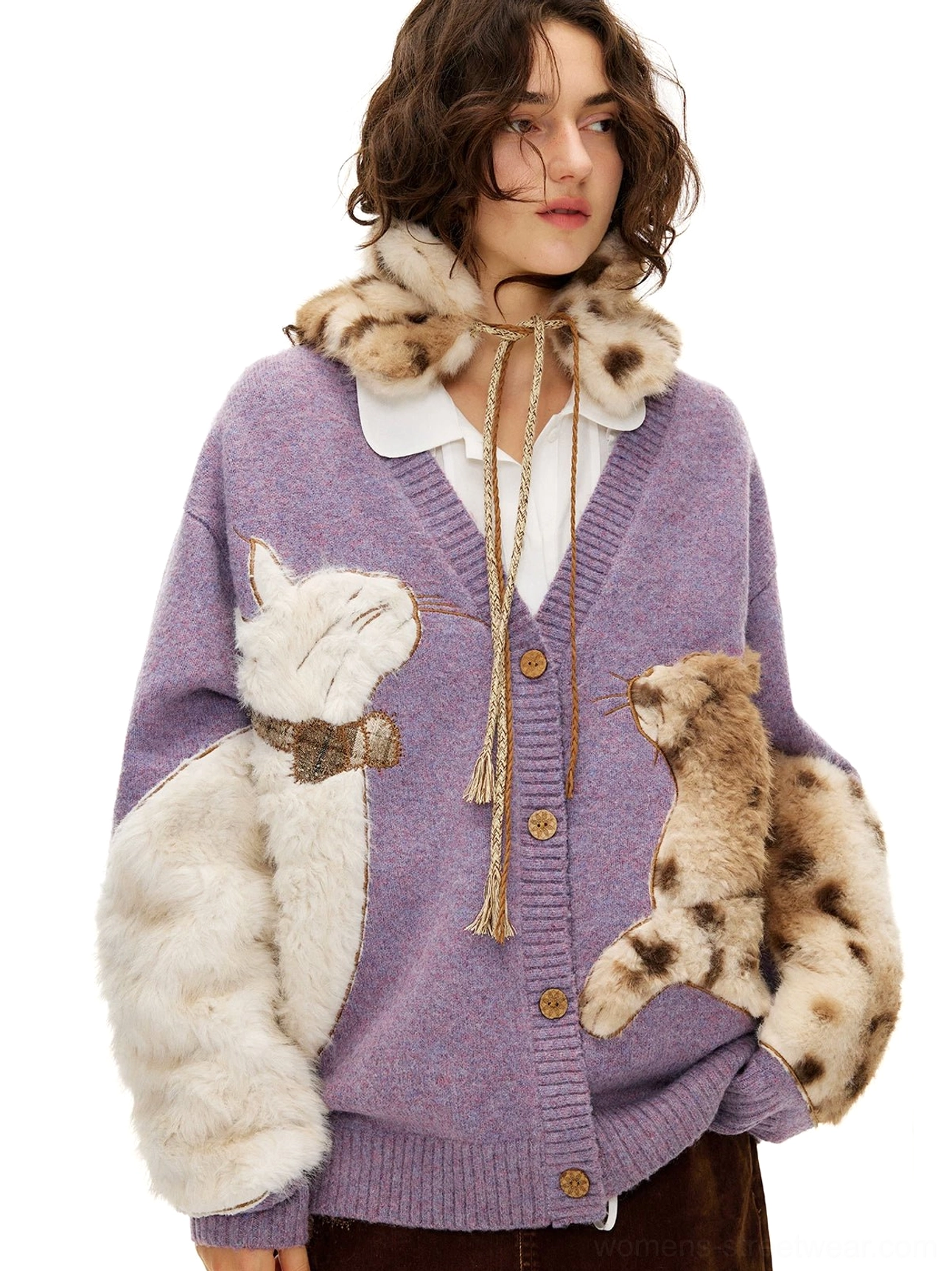 Close-up lavender cat cardigan showing fluffy white and spotted cat appliques, buttoned front placket, and leopard-inspired faux-fur drawstring collar