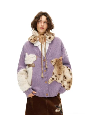 Lavender fuzzy cat cardigan front three-quarter view with plush cat appliques, leopard print faux-fur collar, button closure, and brown corduroy midi skirt styling