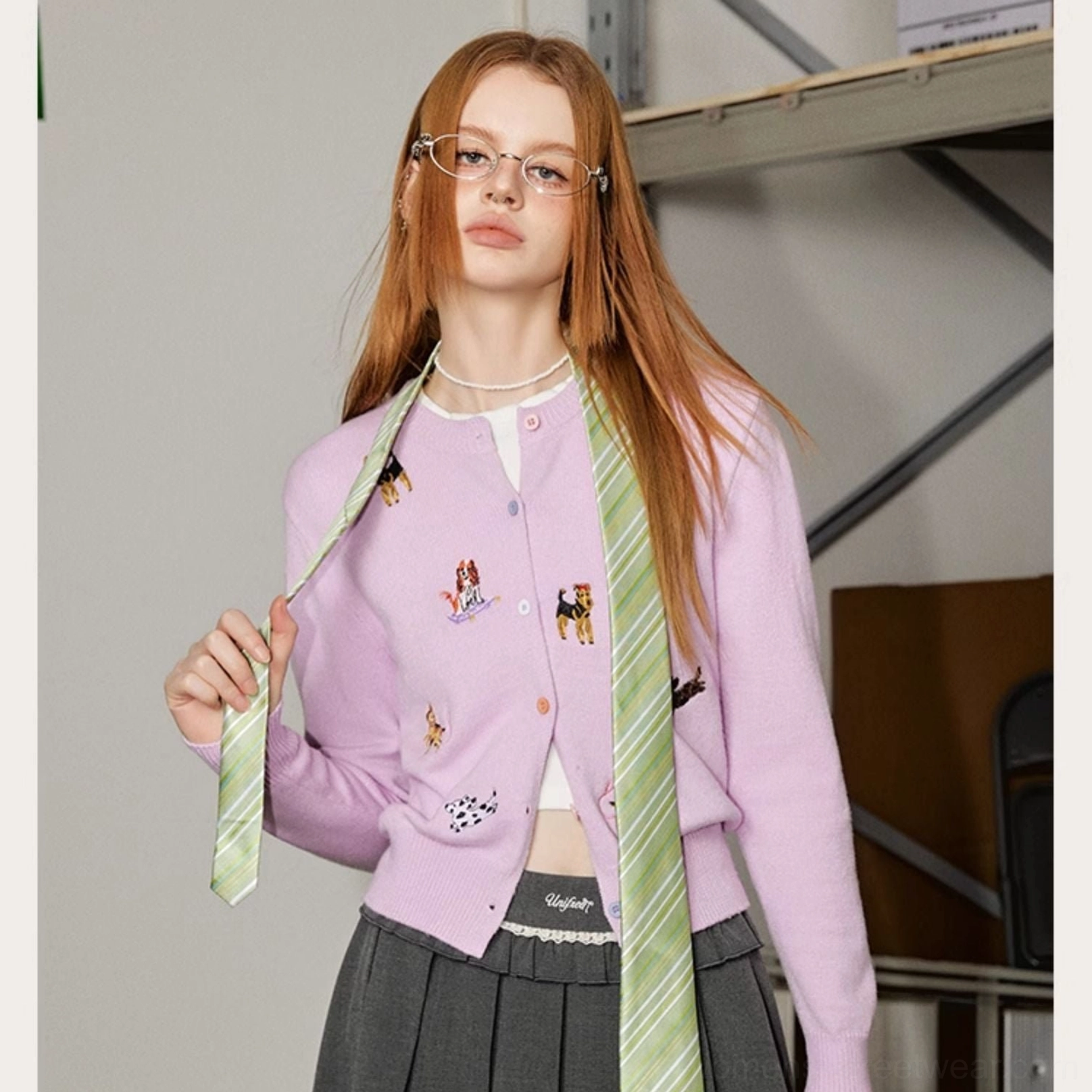 Lavender purple puppy embroidered knit cardigan styled with a green striped tie for playful Korean streetwear