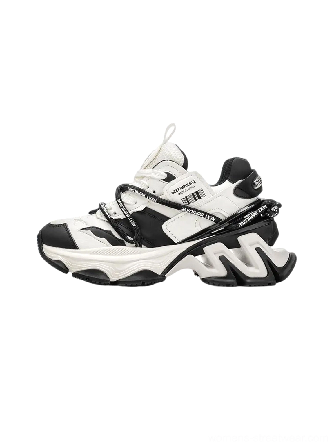 Black and white layered chunky dad sneakers with dual laces and sculpted platform sole left front view
