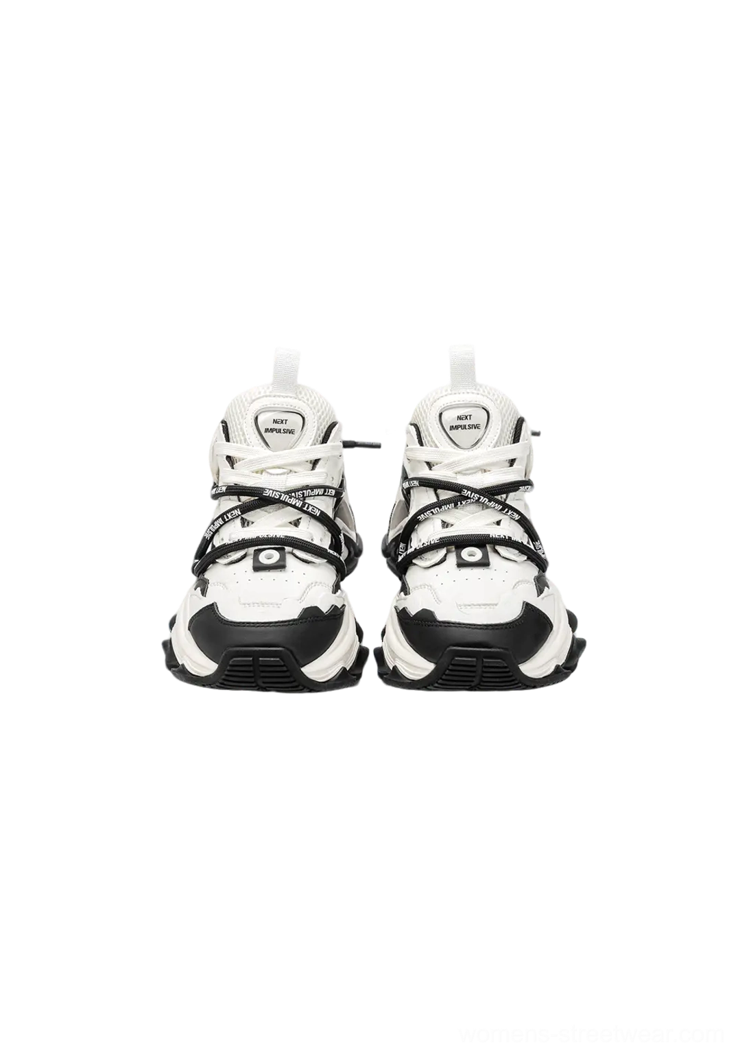 Front view of black and white layered chunky dad sneakers with symmetrical lace-up design