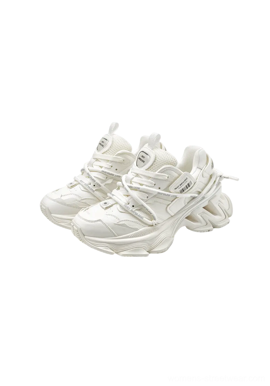 Dual-lace layered chunky dad sneakers close-up with textured panel construction