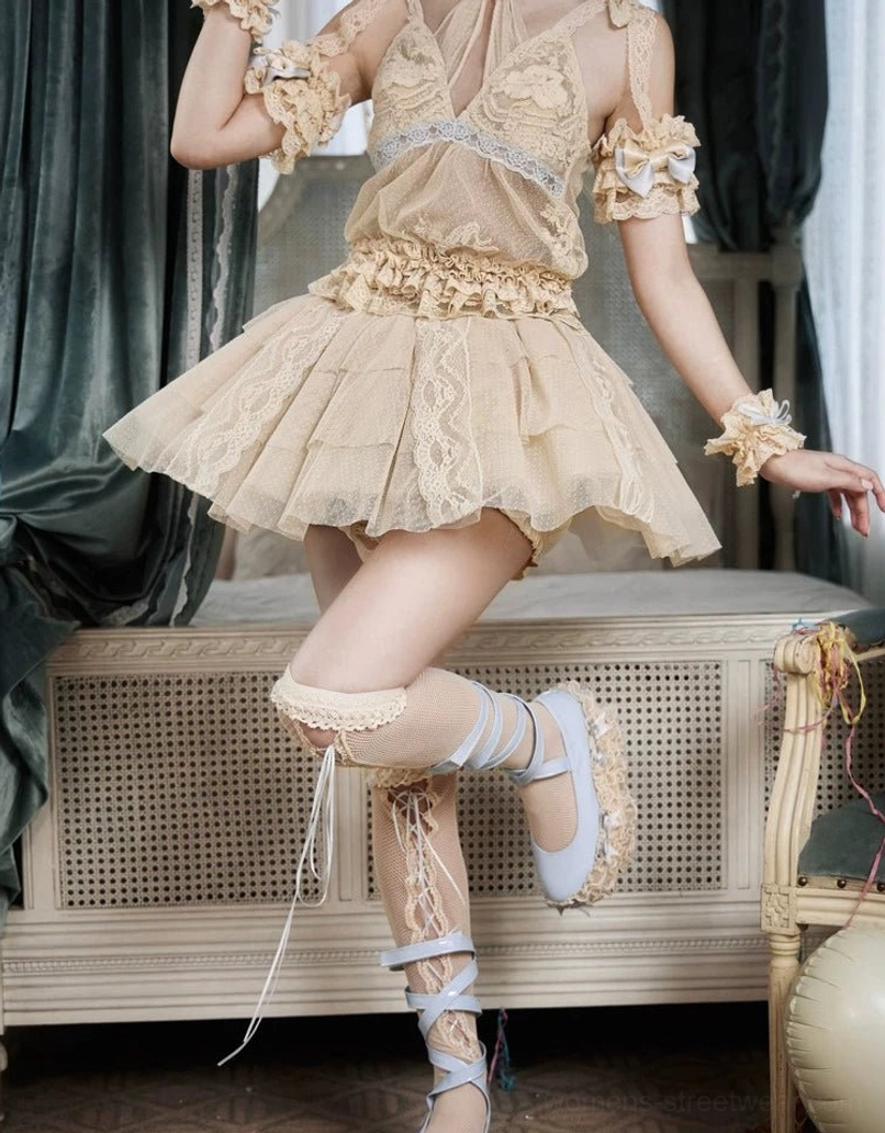 Fashion detail of a layered lace tulle mini skirt designed for alternative streetwear, Korean-inspired styling, and lolita ensembles