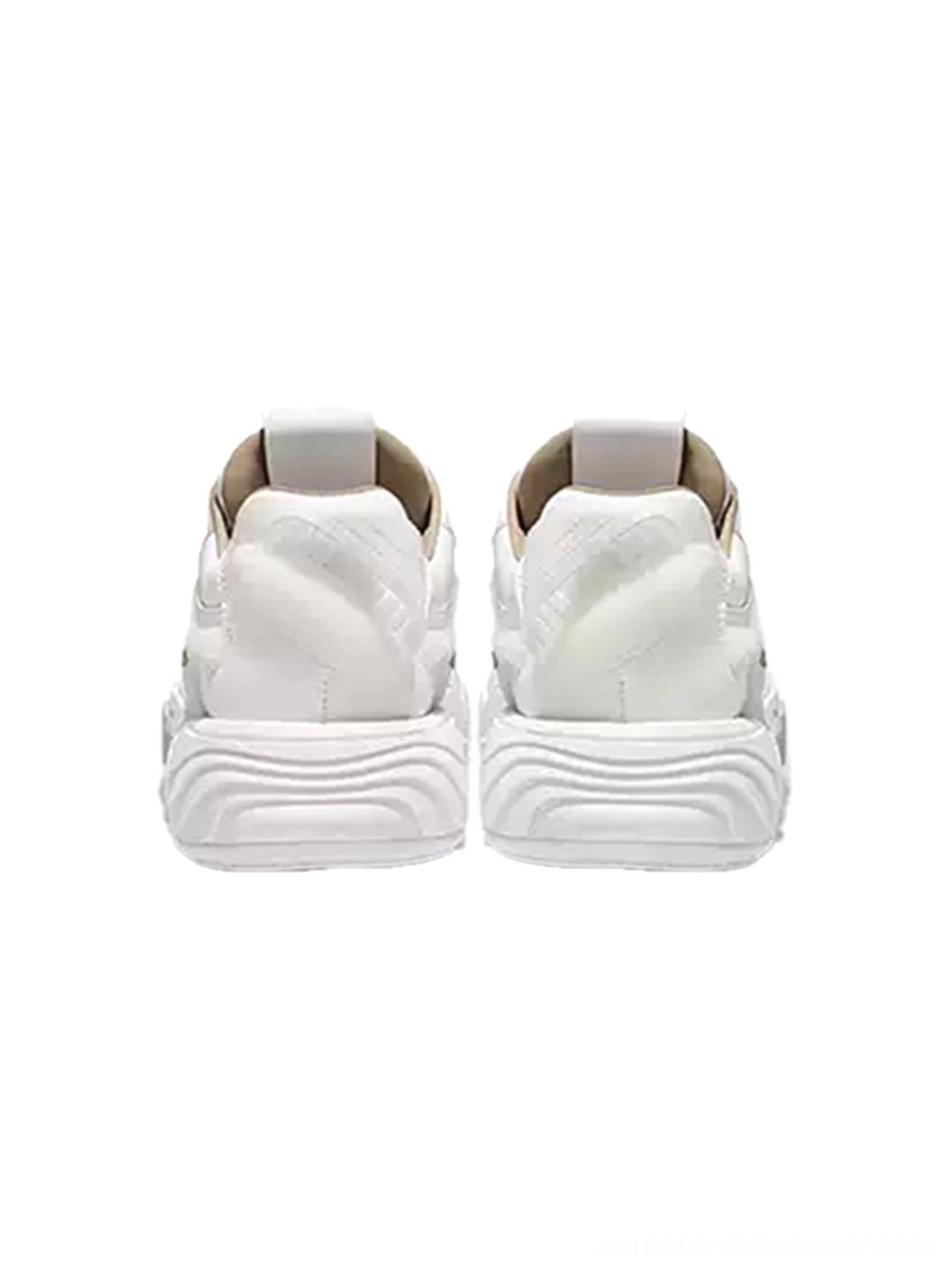 White chunky platform skate sneakers rear view showing heel pull tabs layered leather construction and elevated sole