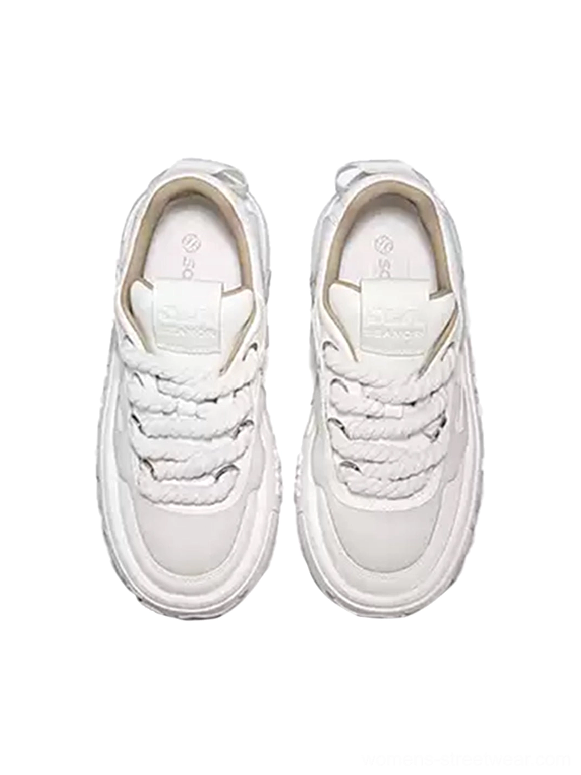 White leather platform skate sneakers top view showing padded tongues thick woven laces and rounded toe boxes