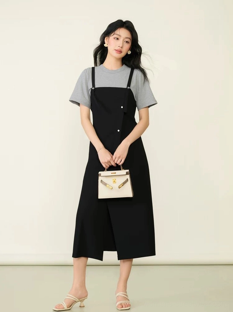 Layered tee and pinafore midi dress styled with a mini white handbag and heeled sandals, featuring a diagonal button front