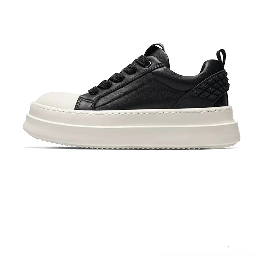 Textured off-white outsole of leather platform sneakers with horizontal striped traction tread