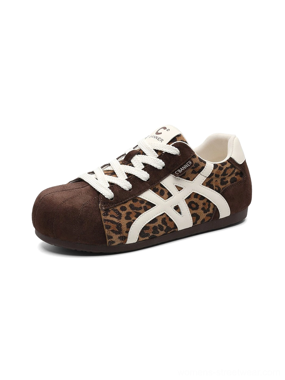 Front three-quarter view of leopard print panel gum sole retro streetwear trainers for women