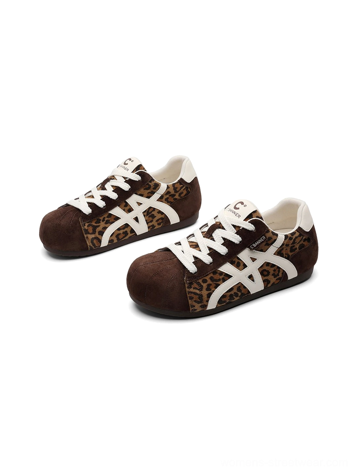Pair of women’s leopard panel gum sole retro trainers with white side stripes and lace-up design