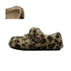 Leopard print fuzzy fleece Mary Jane slippers with rounded closed toe, decorative button strap, plush upper, and thick casual outsole
