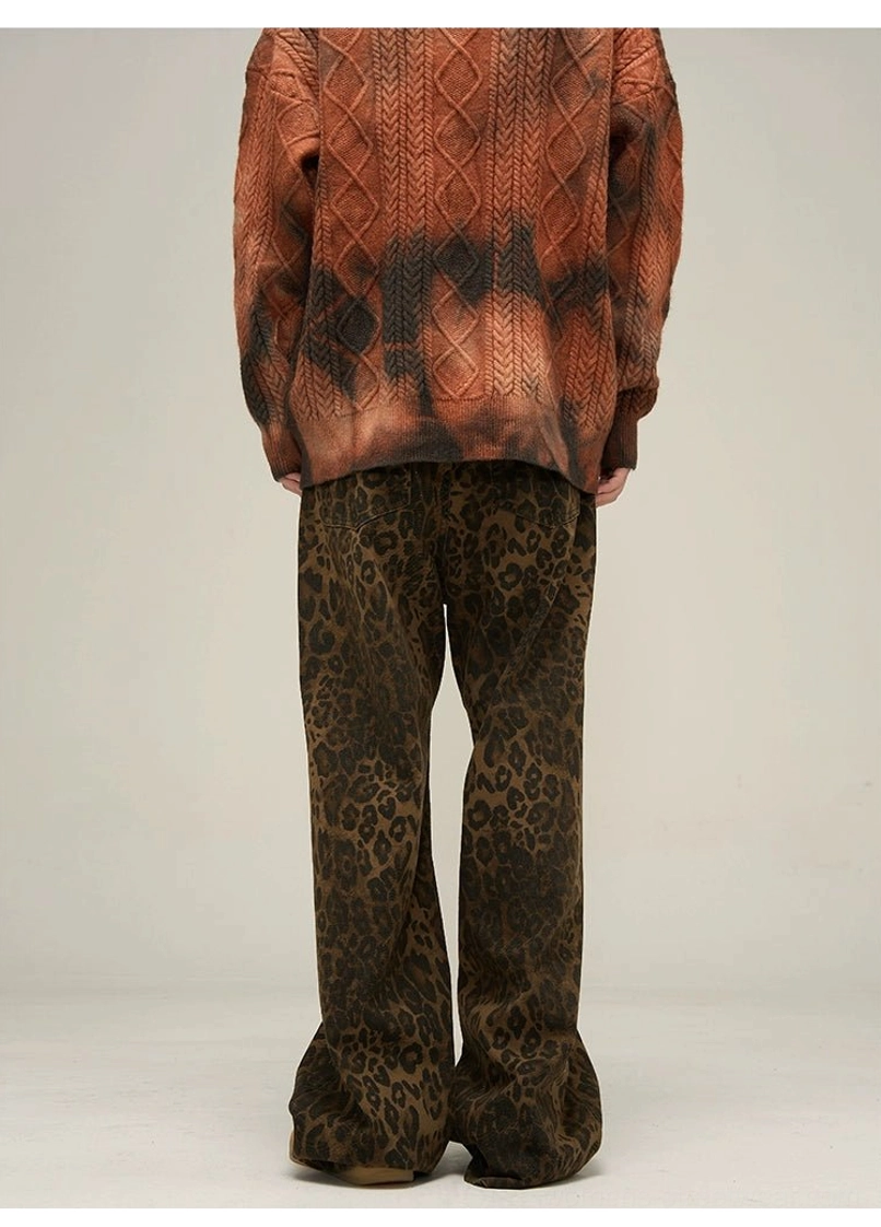 Back view of relaxed leopard print wide leg streetwear pants showing the rear waist, pocket area, and natural leg drape