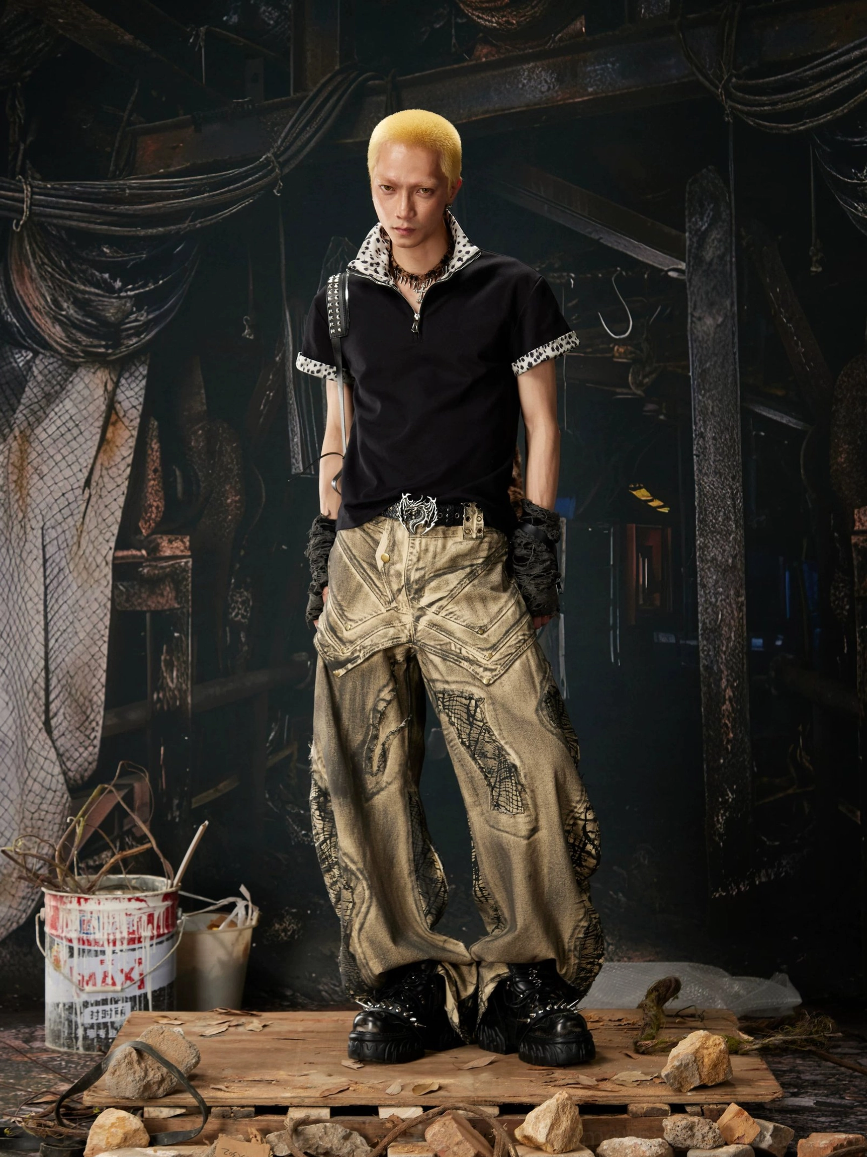 Black leopard trim half-zip polo shirt styled with patched cargo pants and boots in industrial streetwear look