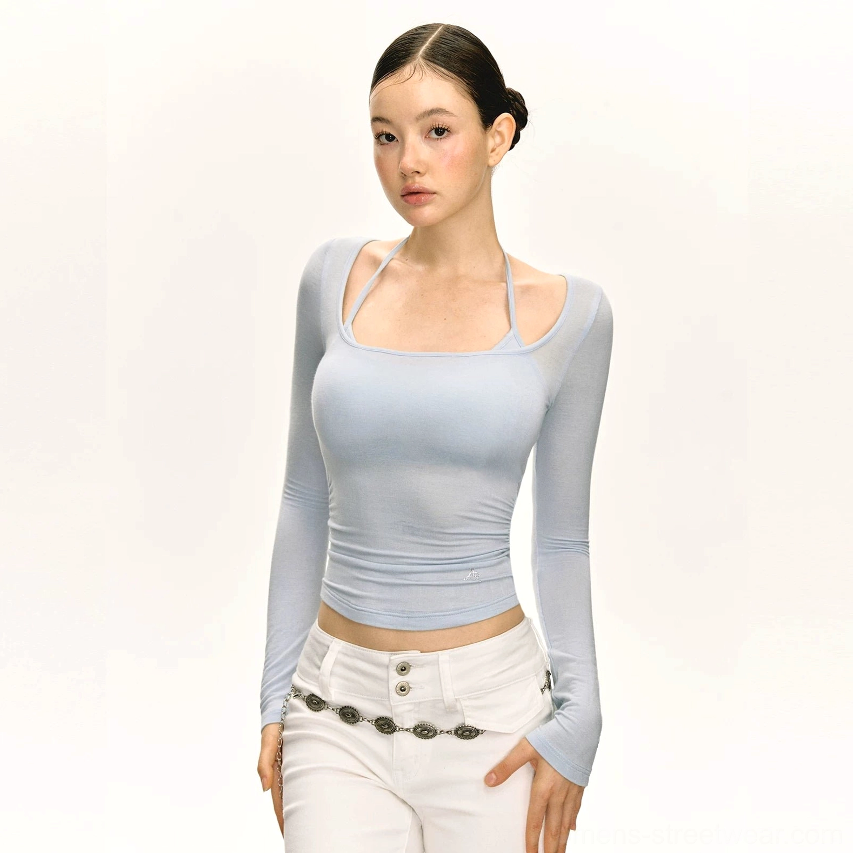 Light blue double strap scoop neck fitted long sleeve crop top with layered neckline and white low-rise pants